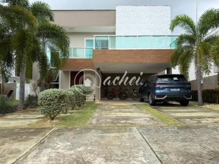 Casa em Alphaville Litoral Norte 1 com suíte no térreo