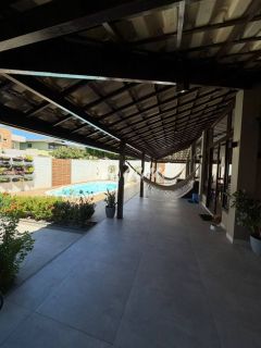 Casa em condomínio fechado com 5 quartos, piscina privativa e terreno de 400m² em Buraquinho, Lauro de Freitas