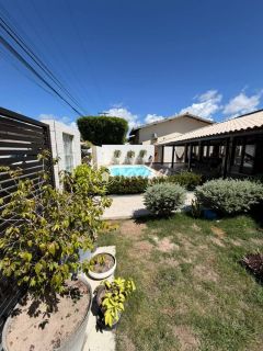 Casa em condomínio fechado com 5 quartos, piscina privativa e terreno de 400m² em Buraquinho, Lauro de Freitas