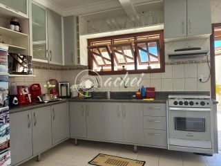 Casa à venda com quarto térreo