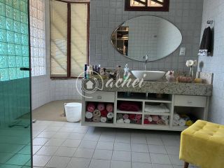 Casa à venda com quarto térreo