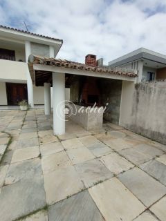 Exclusividade em Alameda Fechada: Casa com 3 Suítes e Lazer Privativo em Vilas do Atlântico