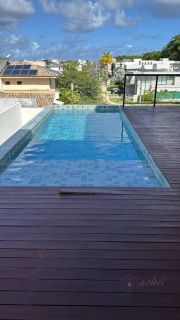 Mansão de Alto Padrão em Alphaville 1 com Piscina Infinita e Vista para a Natureza