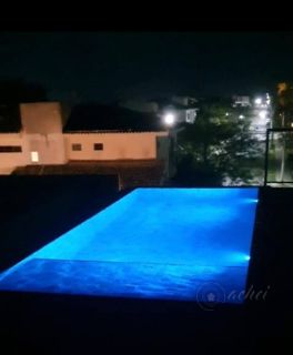 Mansão de Alto Padrão em Alphaville 1 com Piscina Infinita e Vista para a Natureza