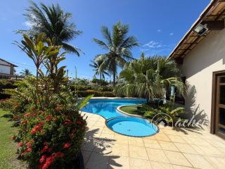 Casa ampla com 4 suítes, piscina e 700 m² de terreno em Vilas do Atlântico