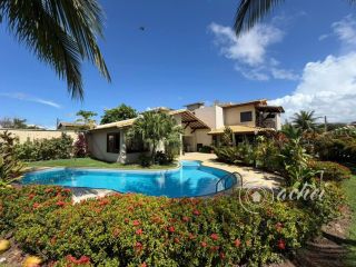 Casa para locação com 4 suítes, piscina e 700 m² em Vilas do Atlântico