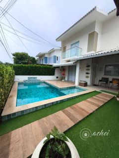 Casa 3 suítes em Buraquinho - Porteira Fechada
