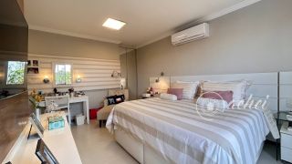 Casa de alto padrão com 4 suítes, piscina privativa e aproximadamente 500 m² de área construída