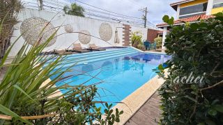 Casa de alto padrão com 4 suítes, piscina privativa e aproximadamente 500 m² de área construída