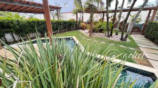 Casa de alto padrão com 4 suítes, piscina privativa e aproximadamente 500 m² de área construída