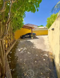 Oportunidade Única na Atalaia Nova – Casa Ampla com Quintal Verdejante!