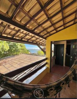 Oportunidade Única na Atalaia Nova – Casa Ampla com Quintal Verdejante!