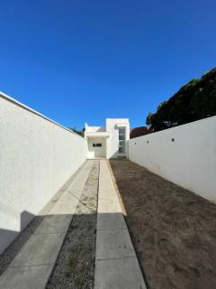 casa plana com 3 quartos suite com closet e pe direito duplo