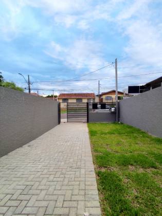 Casa nova e terreno espaçoso