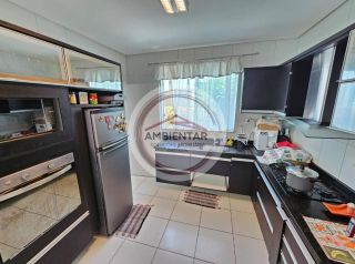 Linda casa com 4/4, sendo 2 suites na Aruana