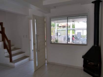 Casa estilo sobrado com 2 dormitórios suítes, no bairro Espírito Santo.