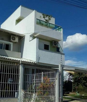 Casa estilo sobrado com 2 dormitórios suítes, no bairro Espírito Santo.