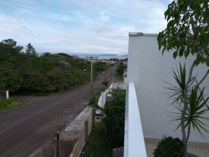 Casa estilo sobrado com 2 dormitórios suítes, no bairro Espírito Santo.