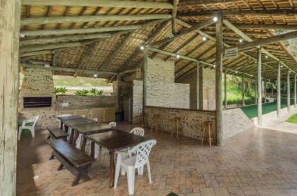 Venda casa em condomínio com 609m², 6 dormitórios, 4 vagas, Bairro Cavalhada, Porto Alegre.