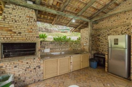 Venda casa em condomínio com 609m², 6 dormitórios, 4 vagas, Bairro Cavalhada, Porto Alegre.