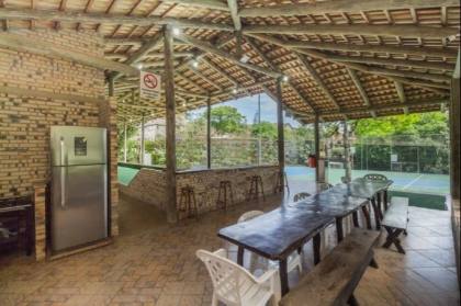 Venda casa em condomínio com 609m², 6 dormitórios, 4 vagas, Bairro Cavalhada, Porto Alegre.