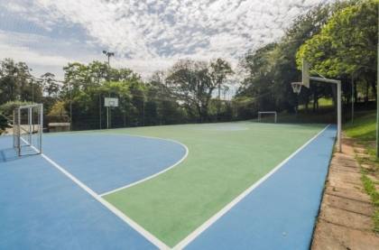 Venda casa em condomínio com 609m², 6 dormitórios, 4 vagas, Bairro Cavalhada, Porto Alegre.