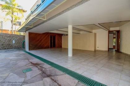 Venda casa em condomínio com 609m², 6 dormitórios, 4 vagas, Bairro Cavalhada, Porto Alegre.