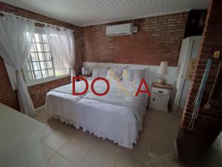 Vende Casa com 4 dormitórios, 2 suítes, 3 vagas, Imbé/RS