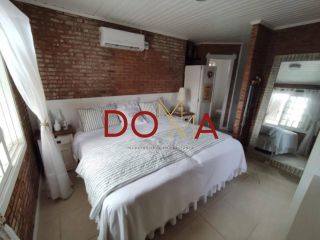 Vende Casa com 4 dormitórios, 2 suítes, 3 vagas, Imbé/RS