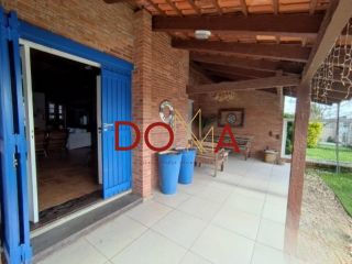 Vende Casa com 4 dormitórios, 2 suítes, 3 vagas, Imbé/RS