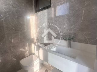 Casa nova no condomínio Quintas da Barra com 4 suítes completas