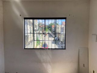 Casa de dois pavimentos à venda - Bairro Lamarão
