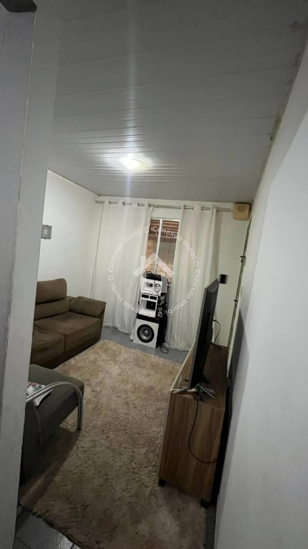 Casa na Aruana | 3/4 com Suíte, Quintal e 2 Vagas de Garagem