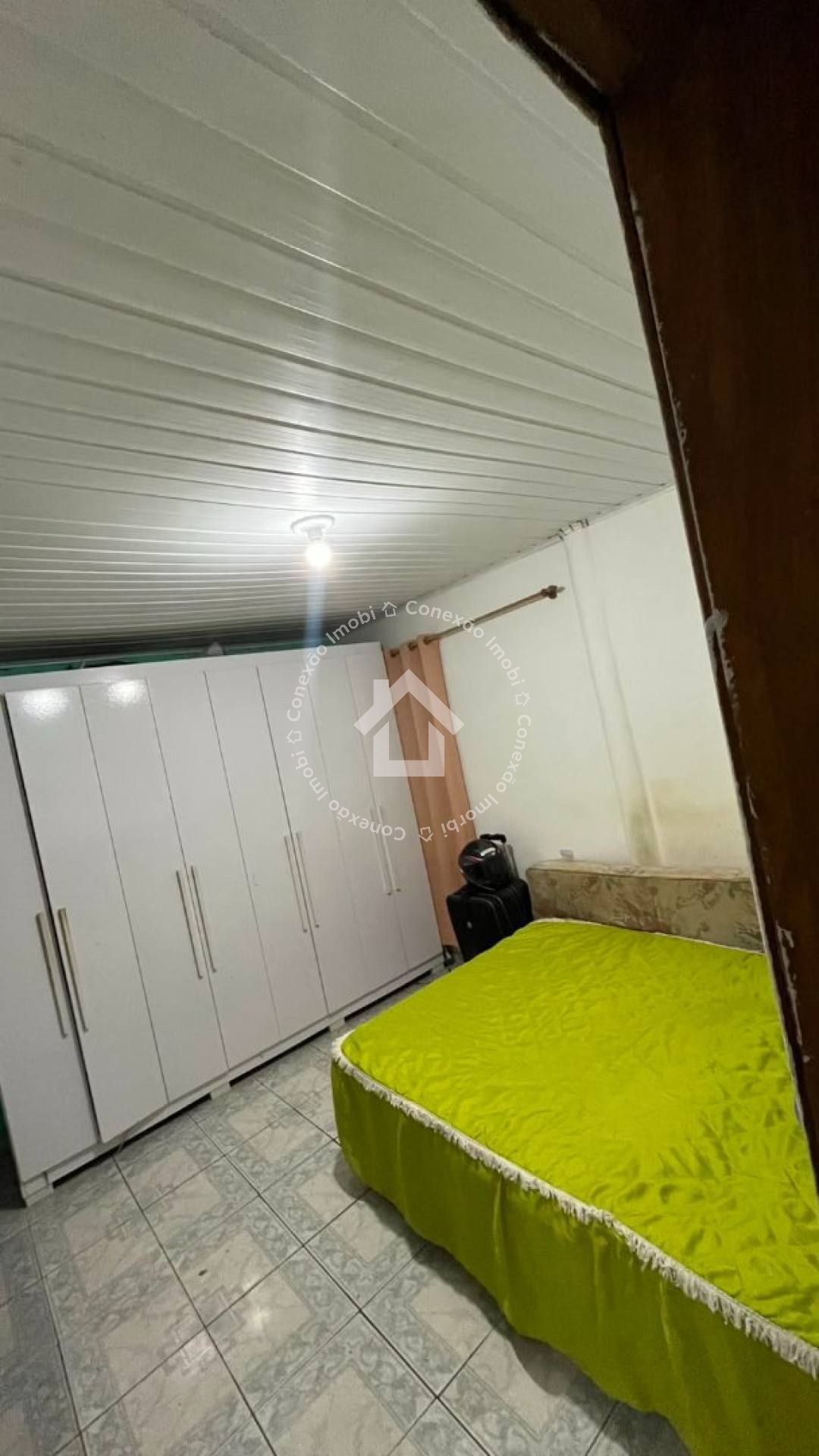 Casa na Aruana | 3/4 com Suíte, Quintal e 2 Vagas de Garagem