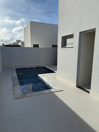 Casa de Condomínio Para Vender com 3 quartos, sendo 1 suíte no bairro Olhos d`Água em Barra Dos Coqueiros