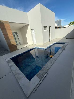 Casa de Condomínio Para Vender com 3 quartos, sendo 1 suíte no bairro Olhos d`Água em Barra Dos Coqueiros