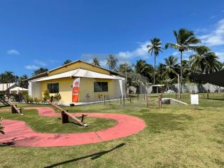 Casa de Condomínio Para Vender com 3 quartos 1 suíte no bairro Olhos d`Água em Barra Dos Coqueiros