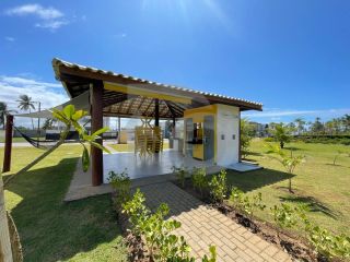 Casa de Condomínio Para Vender com 3 quartos 1 suíte no bairro Olhos d`Água em Barra Dos Coqueiros