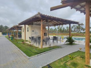 Lote / Terreno de Condomínio Para Vender no bairro Olhos d`Água em Barra Dos Coqueiros