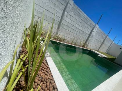 Casa de Condomínio Para Vender com 3 quartos 1 suíte no bairro Olhos d`Água em Barra Dos Coqueiros