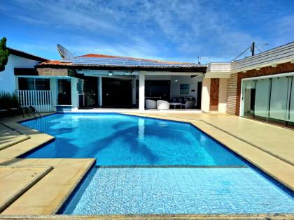 Luxuosa Casa na Atalaia a 500m da Orla – Conforto, Estilo e Lazer Completo!