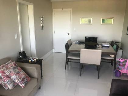 Apartamento no Terraços Beira Mar, 110m², 3 suítes, varanda gourmet e localização privilegiada.