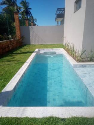 Casa no Condomínio Alphaville Sergipe,  Barra dos Coqueiros 455m², 4 quartos, sendo 4 suíte e com localização privilegiada.