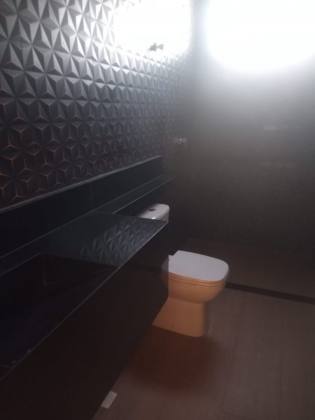 Casa no condomínio Alphaville Sergipe, Barra dos Coqueiros, 455m², 4 quartos, sendo 4 suítes com localização privilegiada.