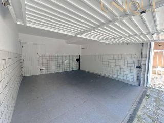 Linda casa no bairro Farolândia em ótima localização.