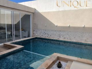 Excelente casa com 3 quartos, sendo 2 suítes e piscina na Aruana.