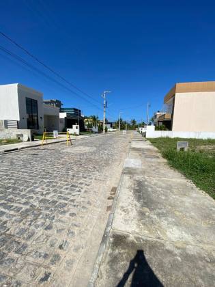 LOTE EM COND. FECHADO SOL E PRAIA