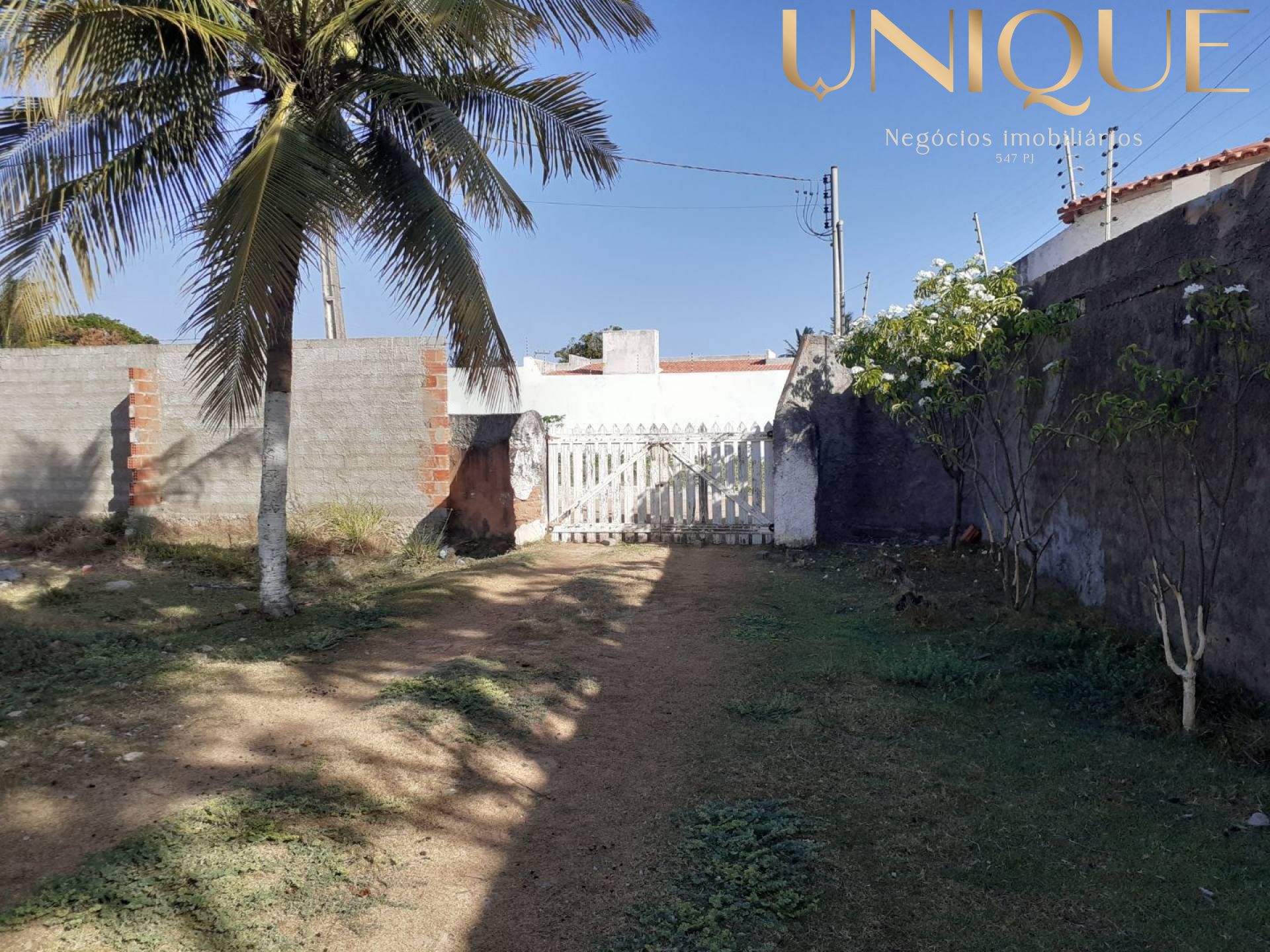 Lote a 500m da praia em rua pública - no Robalo