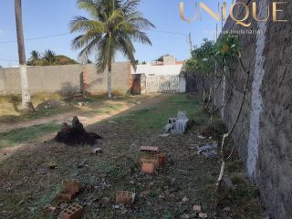Lote a 500m da praia em rua pública - no Robalo