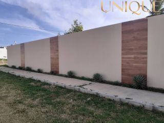Lote a 500m da praia em rua pública - no Robalo